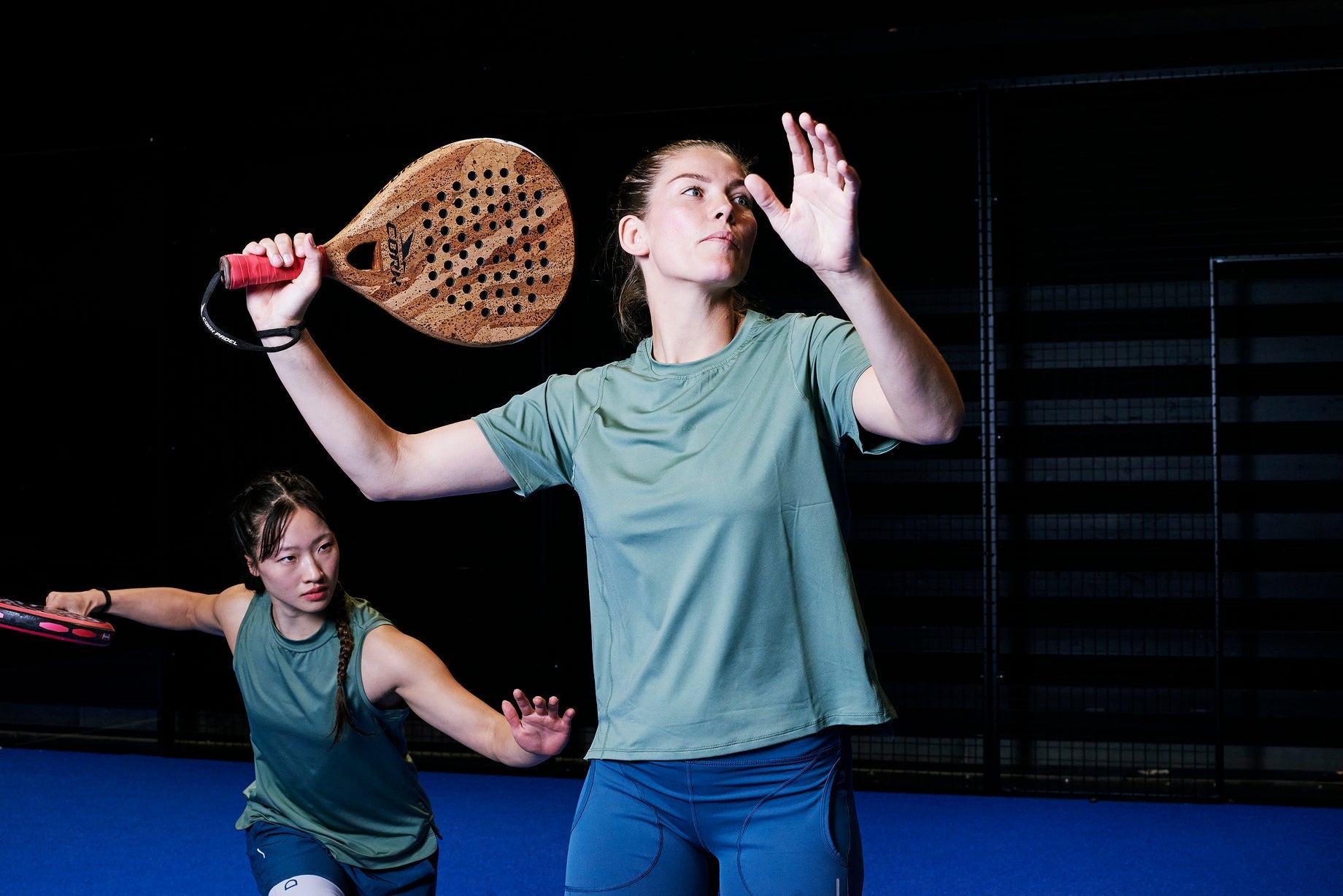 women playing padel tennis